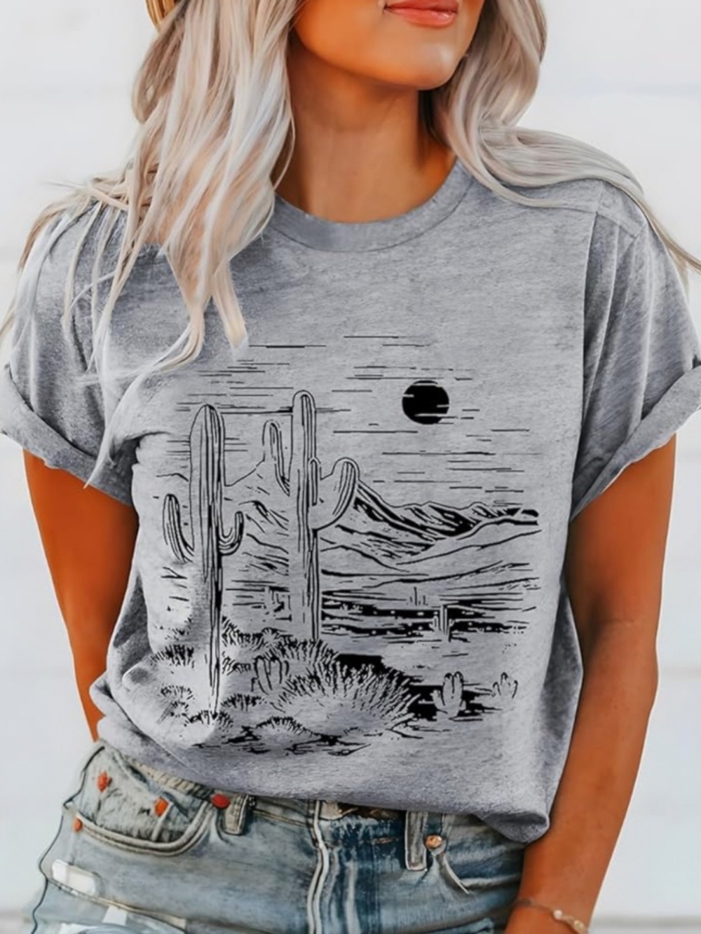 Soft gray women's graphic tee featuring a black desert cactus and mountain print